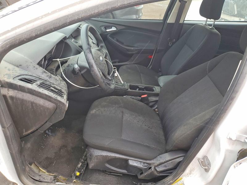 2017 Ford Focus VIN 1FADP3F27HL300674 COPART salvage auction — SIDE, Tx - Salvage Vehicle Title, sold $2,900 on 2026-07-02 (photo 7)