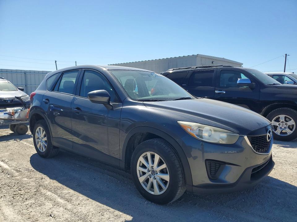2014 Mazda Cx-5 VIN JM3KE4BEXE0317518 COPART salvage auction — HAIL, IA - CERT OF TITLE-SALVAGE TITLE, sold $1,850 on 2026-07-22 (photo 4)
