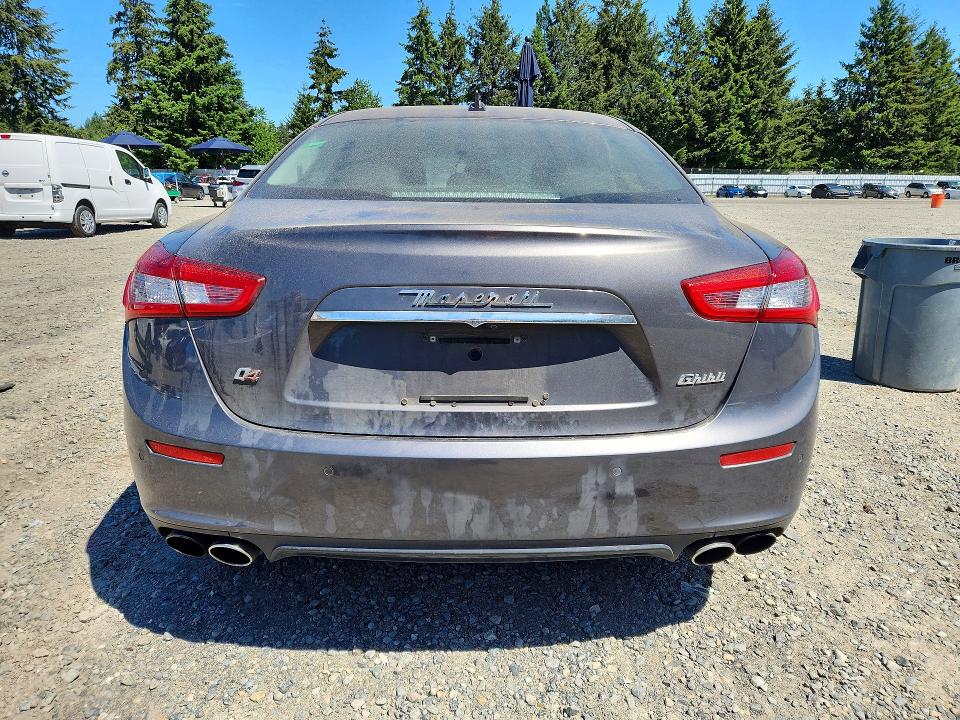 2014 Maserati Ghibli VIN ZAM57RTA7E1113595 COPART salvage auction — MECHANICAL, WA - CERT OF OWNERSHIP-REBUILT, sold $350 on 2026-08-07 (photo 6)