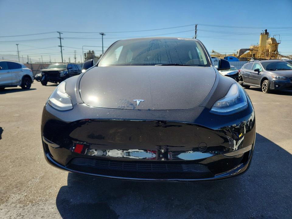2023 Tesla Model 3 VIN 7SAYGDEE0PA061595 COPART salvage auction — SIDE, Salvage Title, sold $250 on 2026-08-03 (photo 5)