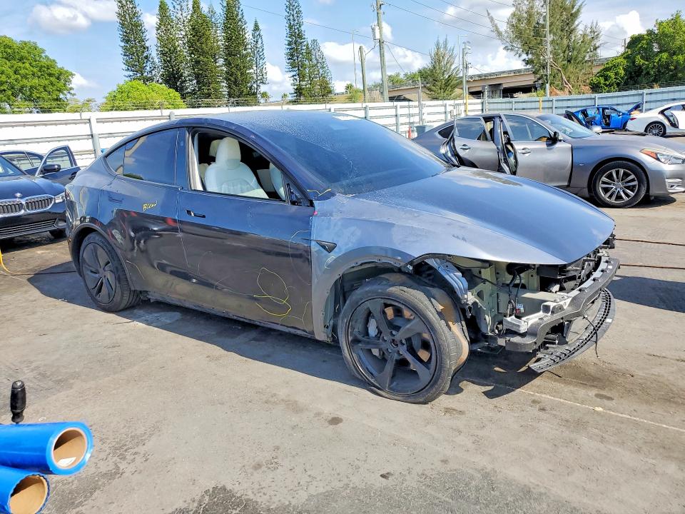 2026 Tesla Model y VIN 7SAYGDEE1TA388288 COPART salvage auction — FRONT END, Fl - Cert Of Title Slvg Rebuildable, sold $19,400 on 2026-07-13 (photo 4)