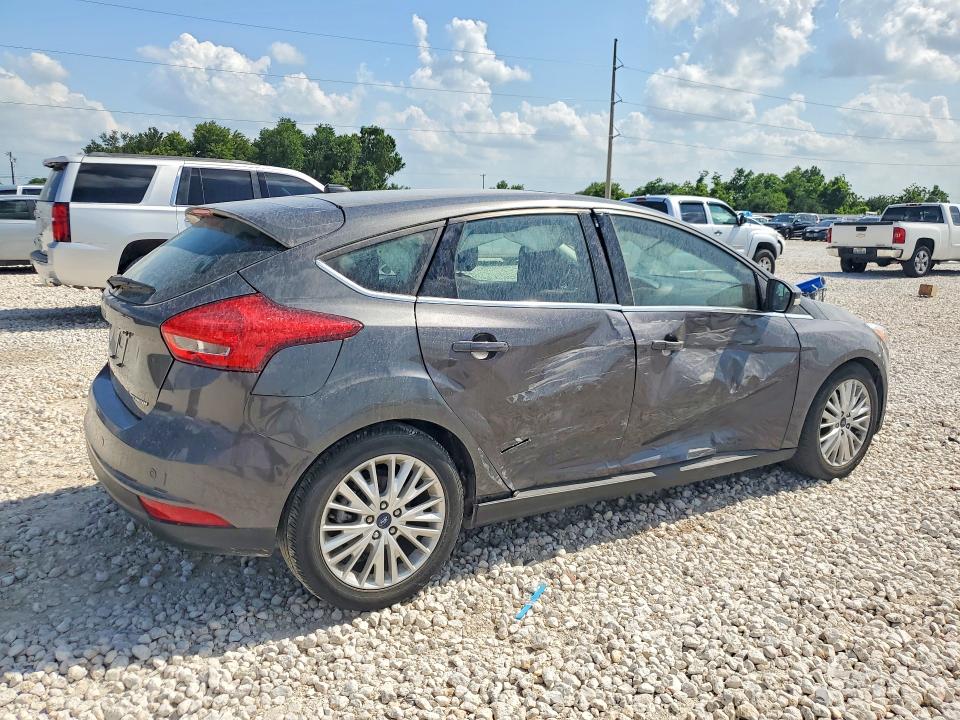 2018 Ford Focus VIN 1FADP3N23JL289650 COPART salvage auction — SIDE, Tx - Salvage Vehicle Title, sold $500 on 2026-07-09 (photo 3)