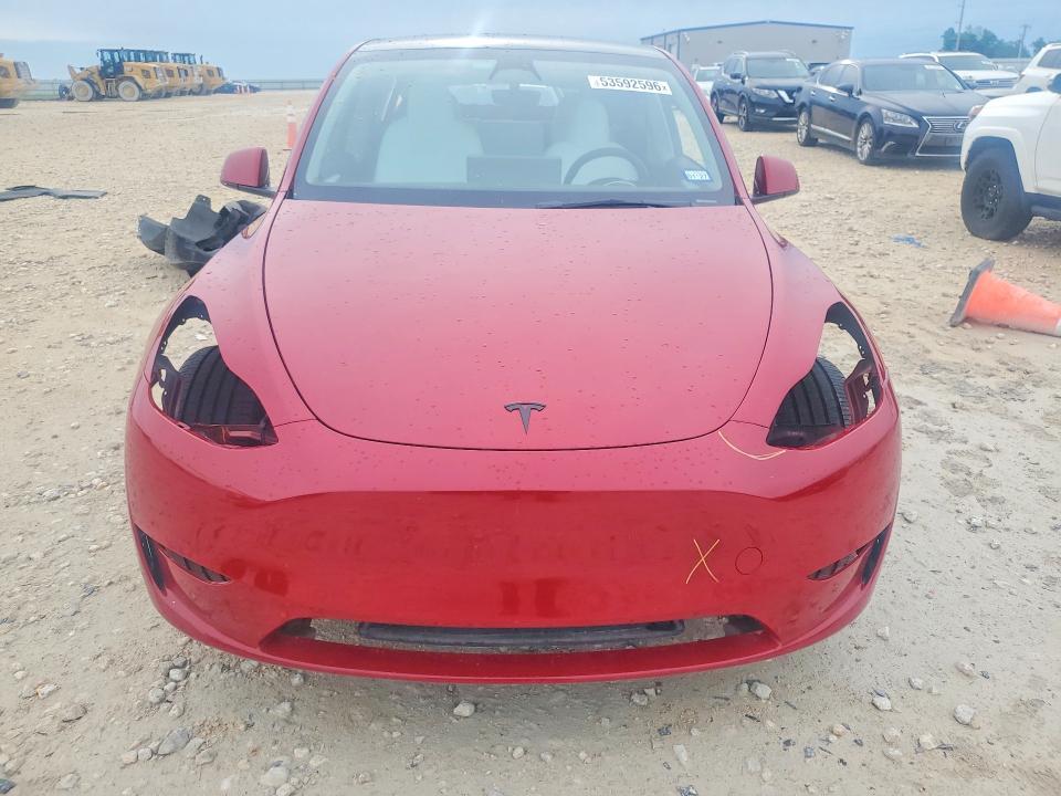 2023 Tesla Model y VIN 7SAYGDEE9PA099620 COPART salvage auction — REAR END, Tx - Salvage Vehicle Title, sold $6,400 on 2026-07-16 (photo 5)