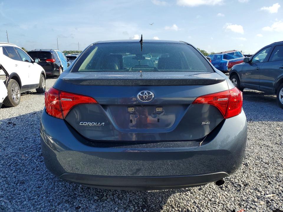 2018 Toyota Corolla VIN 5YFBURHEXJP842546 COPART salvage auction — SIDE, Fl - Cert Of Title Slvg Rebuildable, sold $3,250 on 2026-07-17 (photo 6)