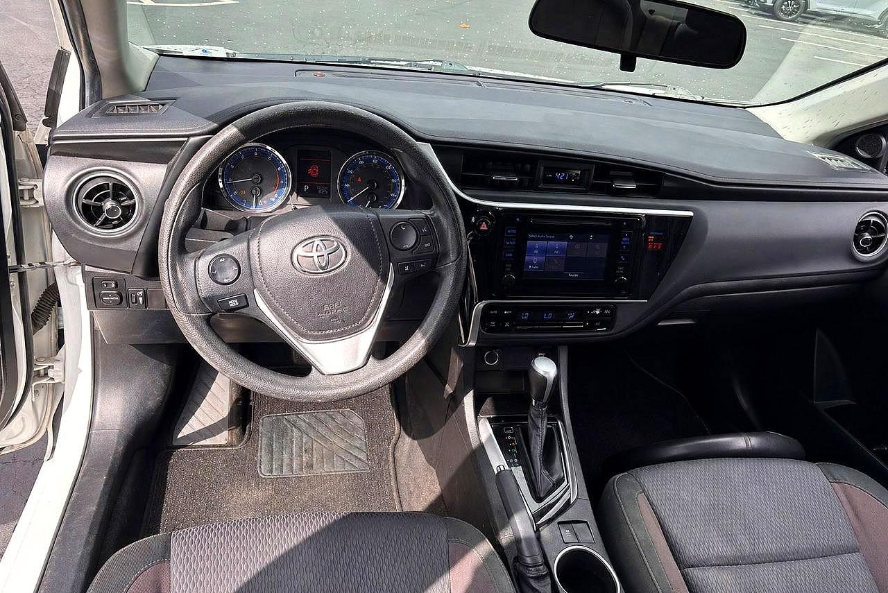 2018 Toyota Corolla VIN 5YFBURHE3JP840007 COPART salvage auction — Minor Dent/Scratches, CA - DIS/DLR/EXP ONLY CLEAN TITLE (P), sold $5,000 on 2026-06-18 (photo 9)