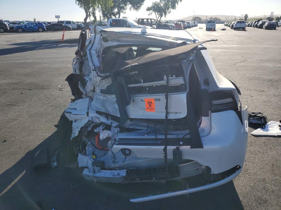 2025 Toyota Prius plug-in VIN JTDACACU4S3050627 COPART salvage auction — ALL OVER, Ca - Non-Repairable Vehicle Cert, sold $2,300 on 2026-07-13 (photo 6)