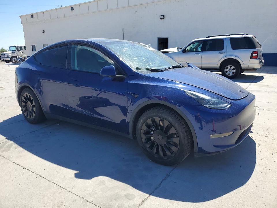 2023 Tesla Model y VIN 7SAYGAEE5PF853243 COPART salvage auction — FRONT END, Ut - Salvage Certificate, sold $8,800 on 2026-07-13 (photo 4)