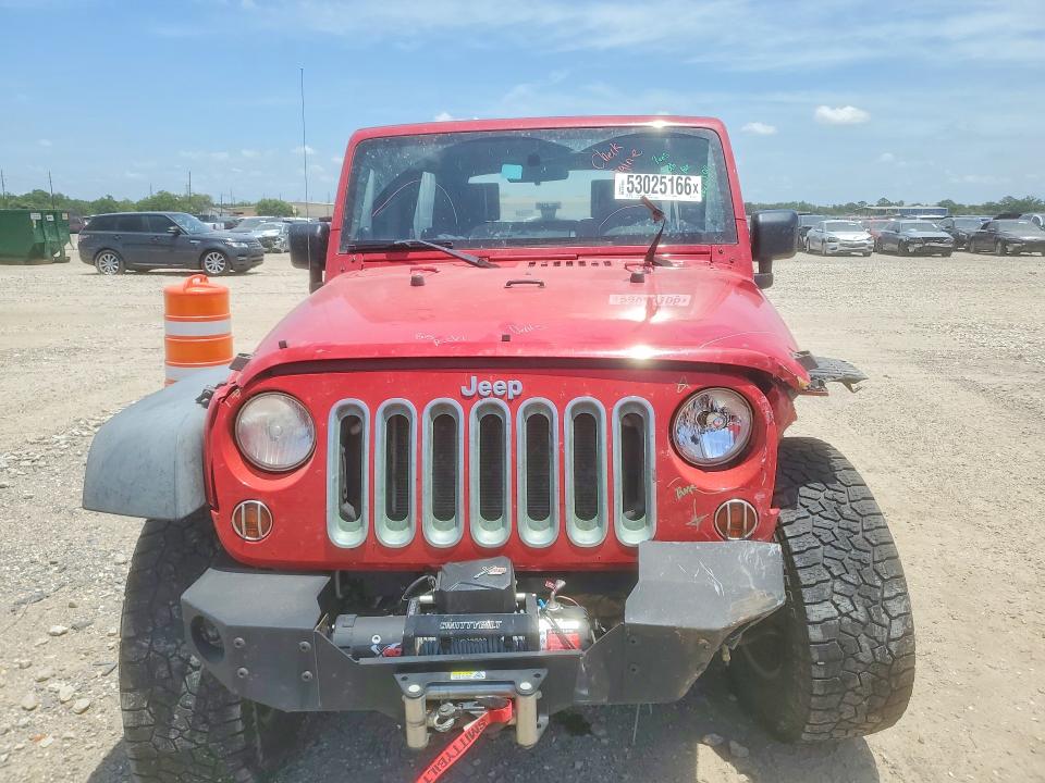 2010 Jeep Wrangler unlimited VIN 1J4BA3H14AL143614 COPART salvage auction — FRONT END, TX - SALVAGE VEHICLE TITLE, sold $2,600 on 2026-07-09 (photo 5)