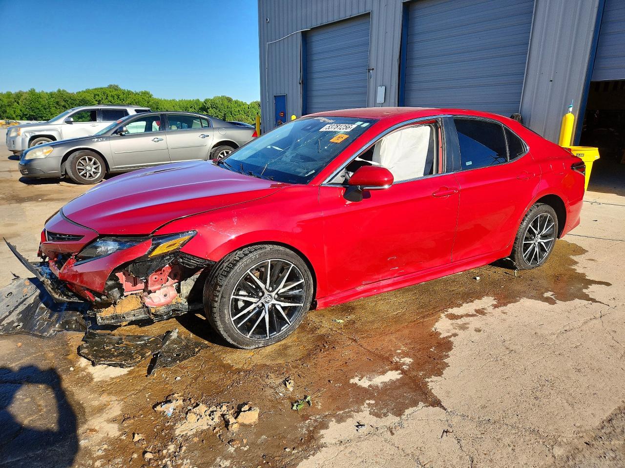 2023 Toyota Camry VIN 4T1G11AKXPU155672 COPART salvage auction — Side, MS - CERT OF TITLE-SALVAGED, sold $4,750 on 2026-07-09 (photo 1)