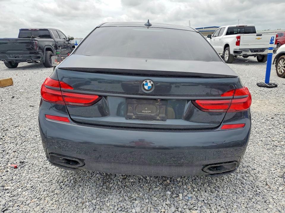 2019 BMW 7er VIN WBA7E2C5XKB217854 COPART salvage auction — FRONT END, Tx - Salvage Vehicle Title, sold $125 on 2026-08-03 (photo 6)