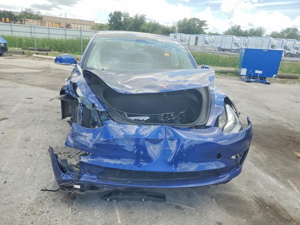 2019 Tesla Model 3 VIN 5YJ3E1EB2KF530098 COPART salvage auction — FRONT END, FL - CERT OF TITLE SLVG REBUILDABLE, sold $3,800 on 2026-07-02 (photo 5)