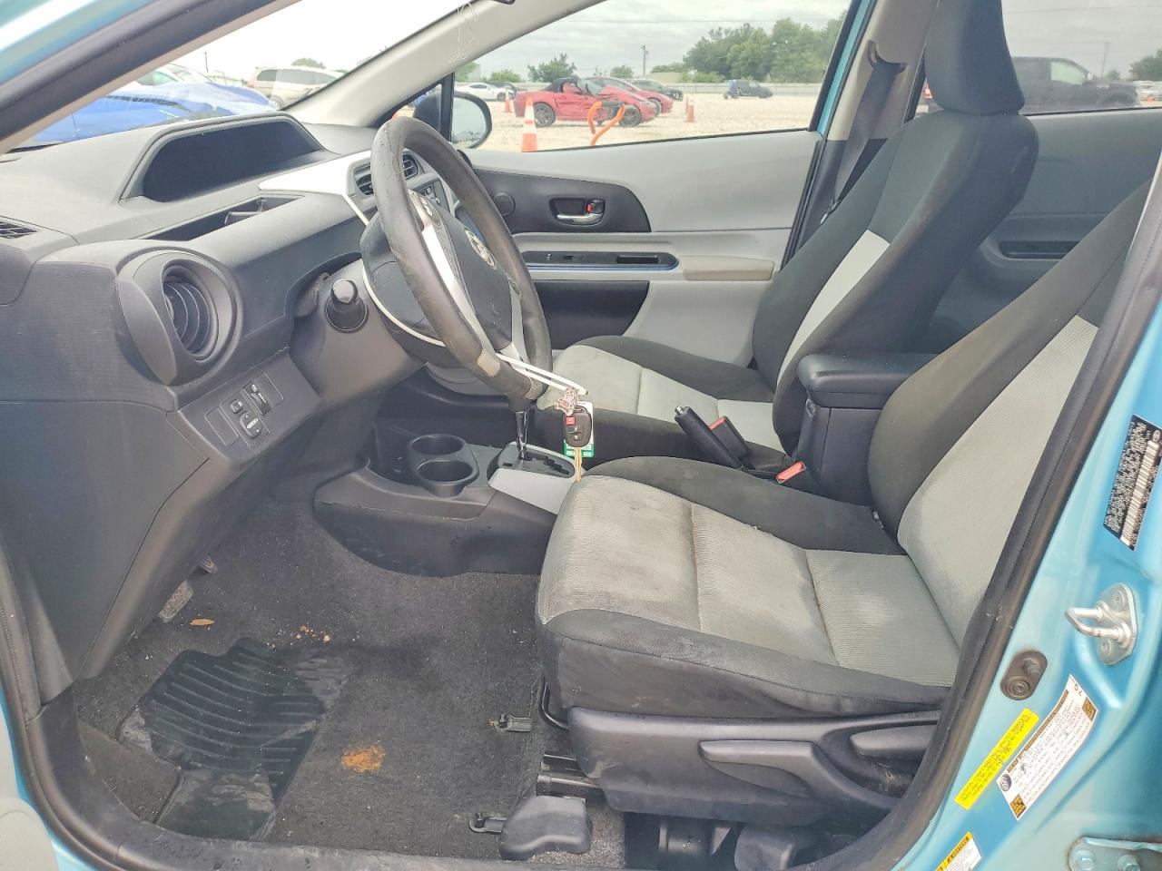 2012 Toyota Prius C VIN JTDKDTB37C1018273 COPART salvage auction — Front End, TX - SALVAGE VEHICLE TITLE (P), sold $475 on 2026-07-09 (photo 7)