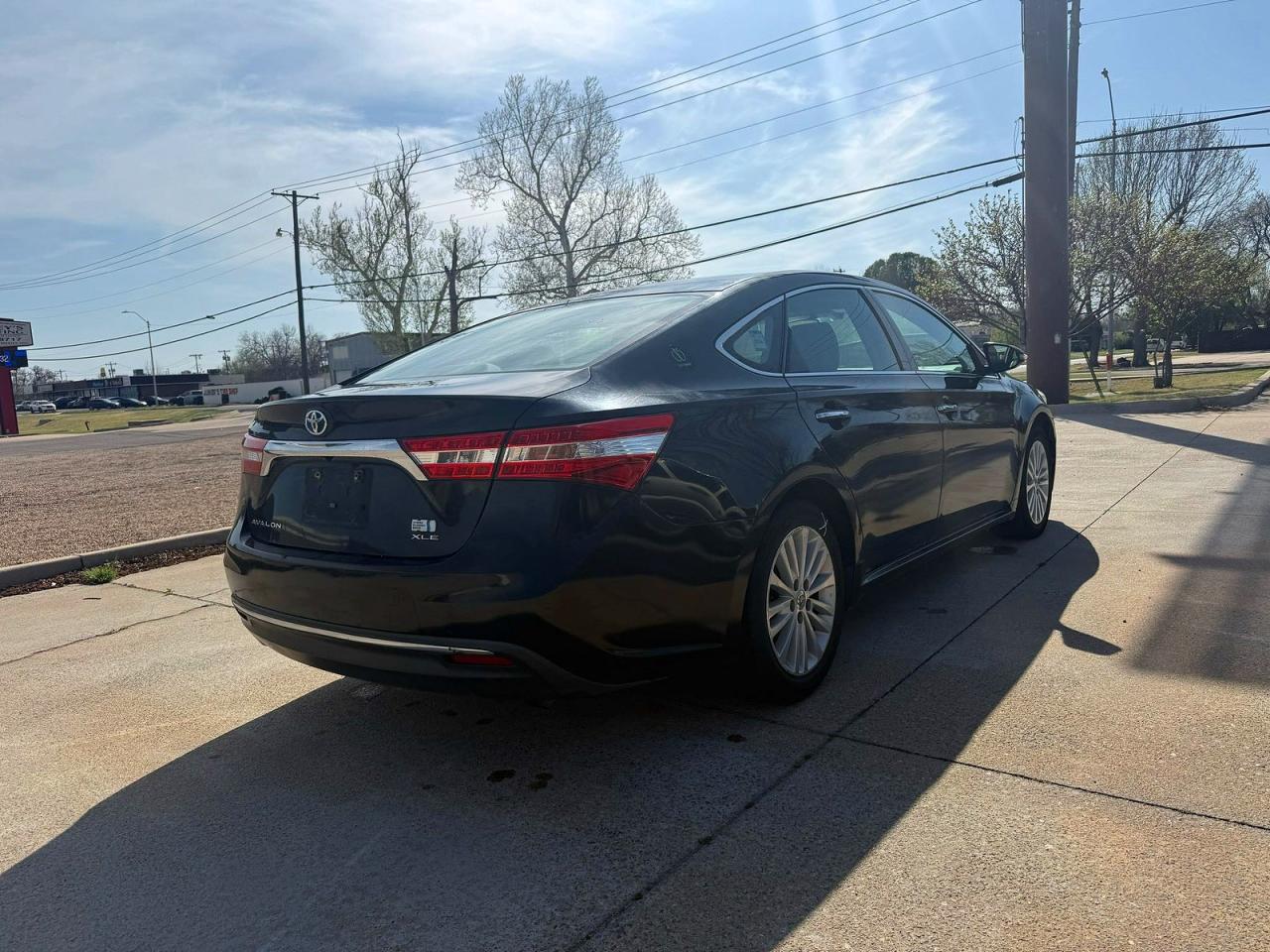 2014 Toyota Avalon Hybrid VIN 4T1BD1EB7EU021808 COPART salvage auction — Minor Dent/Scratches, OK - CERTIFICATE OF TITLE (P), sold $1,150 on 2026-06-25 (photo 4)