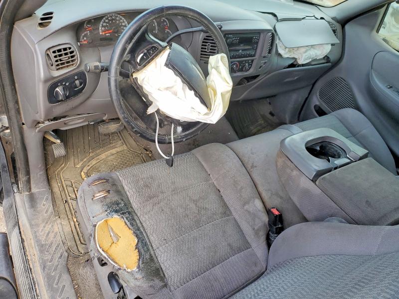 2003 Ford F-150 lightning VIN 1FTRX07W33KD10259 COPART salvage auction — SIDE, Tx - Salvage Vehicle Title, sold $450 on 2026-07-02 (photo 8)