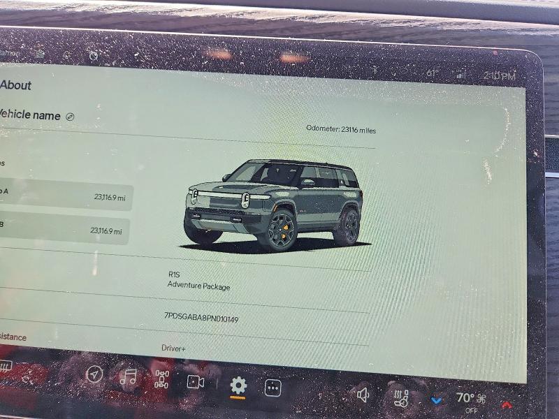 2023 Rivian VIN 7PDSGABA8PN010149 COPART salvage auction — SIDE, Salvage Title, sold $21,600 on 2026-08-13 (photo 9)