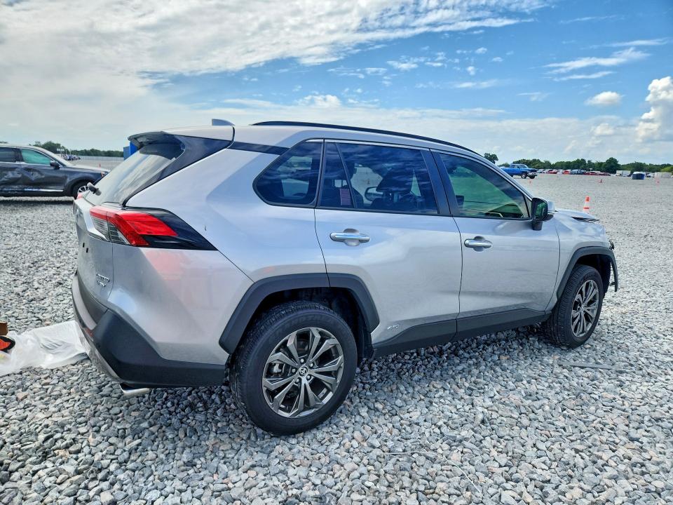 2025 Toyota Rav 4 VIN JTMD6RFVXSJ072814 COPART salvage auction — SIDE, Fl - Cert Of Title Slvg Rebuildable, sold $17,000 on 2026-07-06 (photo 3)