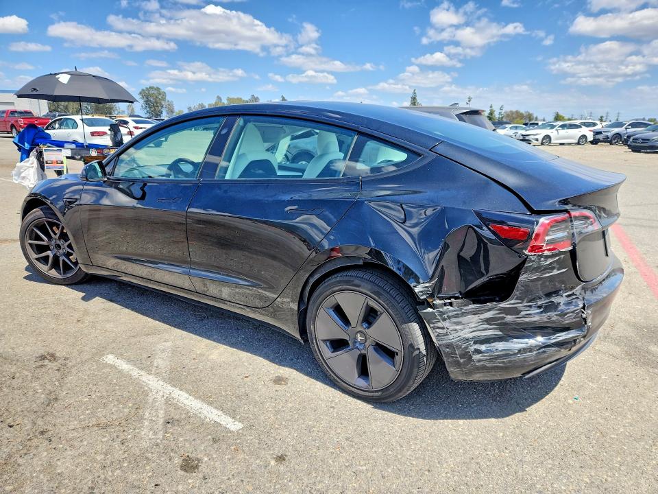 2023 Tesla Model 3 VIN 5YJ3E1EAXPF581783 COPART salvage auction — REAR END, CA - SALVAGE CERTIFICATE, sold $8,200 on 2026-07-21 (photo 2)