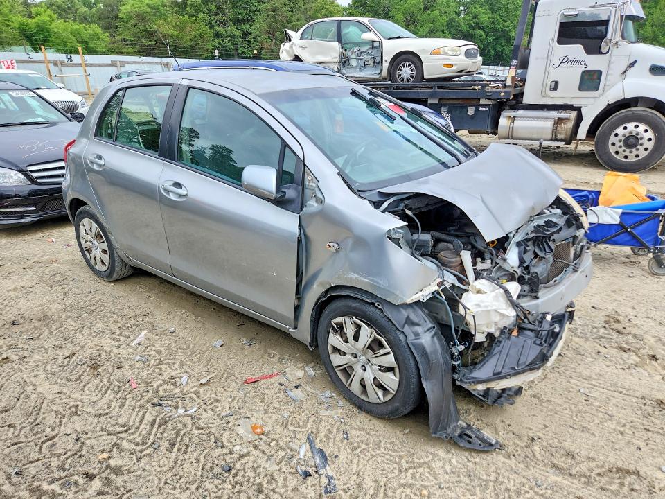 2011 Toyota Yaris VIN JTDKT4K35B5327353 COPART salvage auction — FRONT END, Md - Cert Of Salvage > 75% Damage, sold $625 on 2026-07-14 (photo 4)