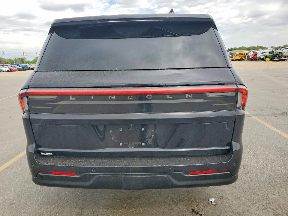 2025 Lincoln Navigator VIN 5LMJJ3LG5SEL13099 COPART salvage auction — SIDE, Id - Salvage Certificate Of Title, sold $67,500 on 2026-07-09 (photo 6)