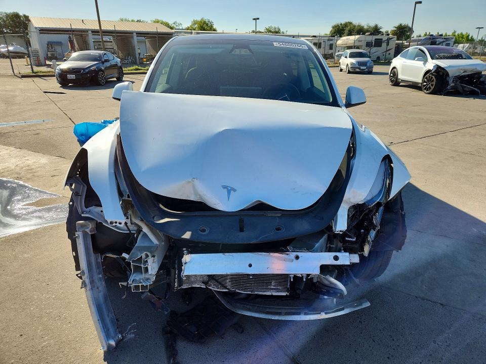 2024 Tesla Model y VIN 7SAYGDEF1RF181551 COPART salvage auction — FRONT END, Ca - Salvage Certificate, sold $13,100 on 2026-07-13 (photo 5)