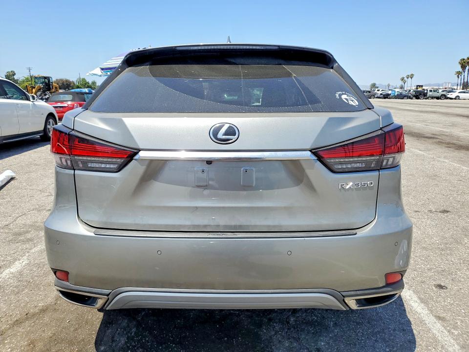 2021 Lexus Rx VIN 2T2JZMAA3MC189291 COPART salvage auction — SIDE, Ca - Salvage Certificate, sold $14,100 on 2026-07-02 (photo 6)