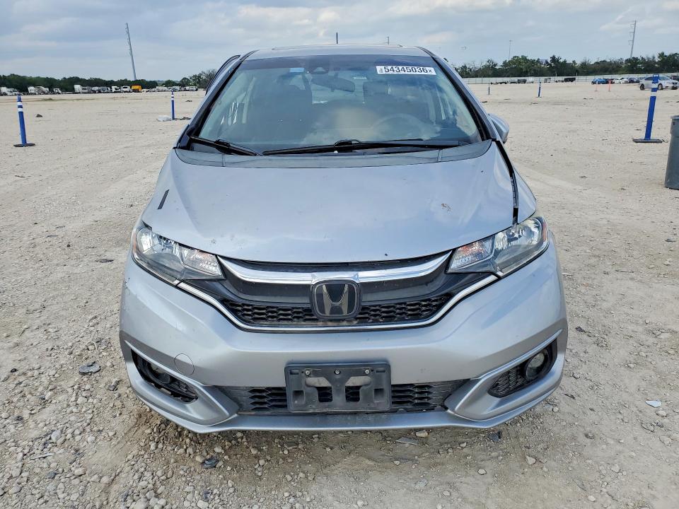 2018 Honda Fit VIN 3HGGK5H89JM717996 COPART salvage auction — SIDE, Tx - Salvage Vehicle Title, sold $2,000 on 2026-07-09 (photo 5)