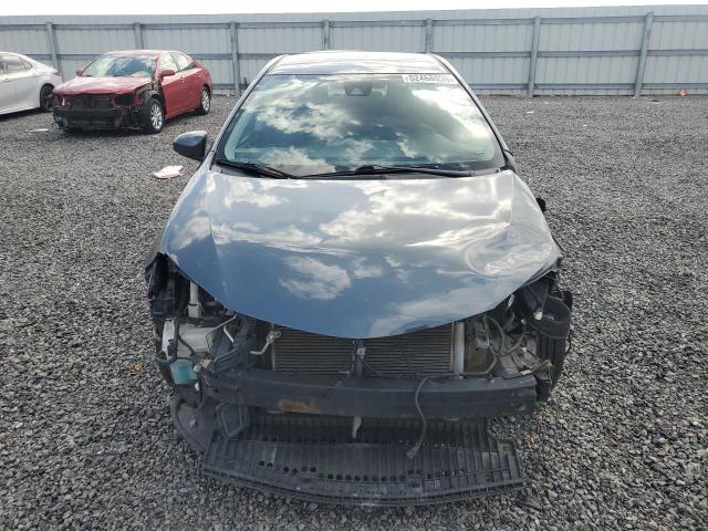 2018 Toyota Corolla VIN 5YFBURHE1JP811847 COPART salvage auction — FRONT END, Fl - Cert Of Title Slvg Rebuildable, sold $3,850 on 2026-07-07 (photo 5)