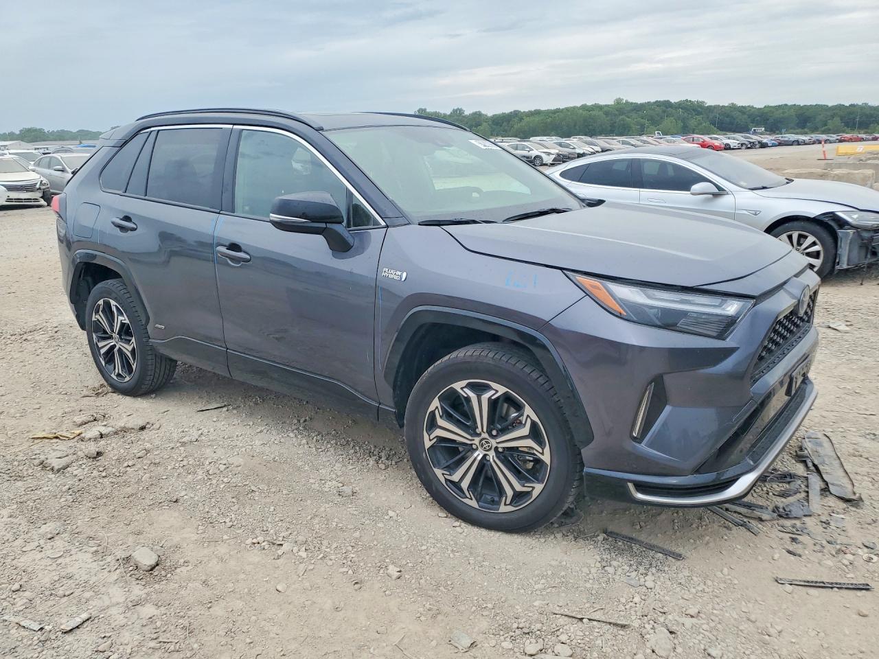 2023 Toyota RAV4 Prime VIN JTMEB3FVXPD124915 COPART salvage auction — Rear End, MO - SALVAGE CERTIFICATE OF TITLE, sold $24,300 on 2026-07-07 (photo 4)