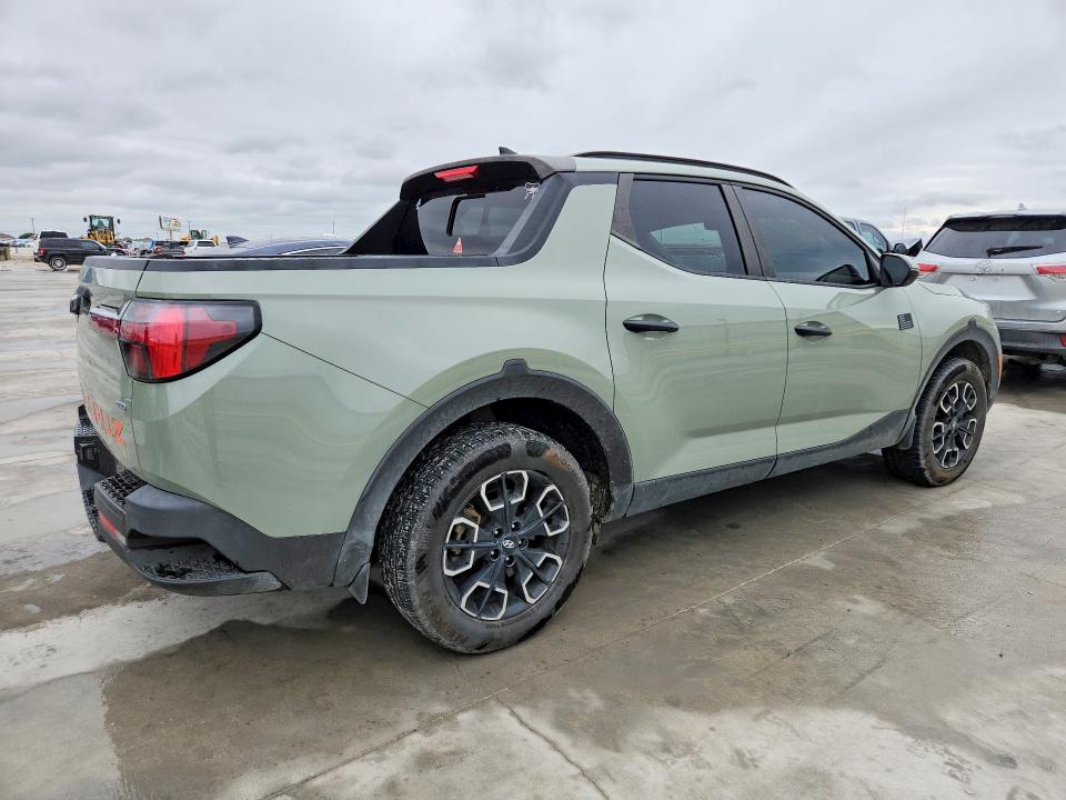 2022 Hyundai Santa cruz VIN 5NTJCDAE7NH030167 COPART salvage auction — HAIL, Tx - Certificate Of Title, sold $11,400 on 2026-07-14 (photo 3)