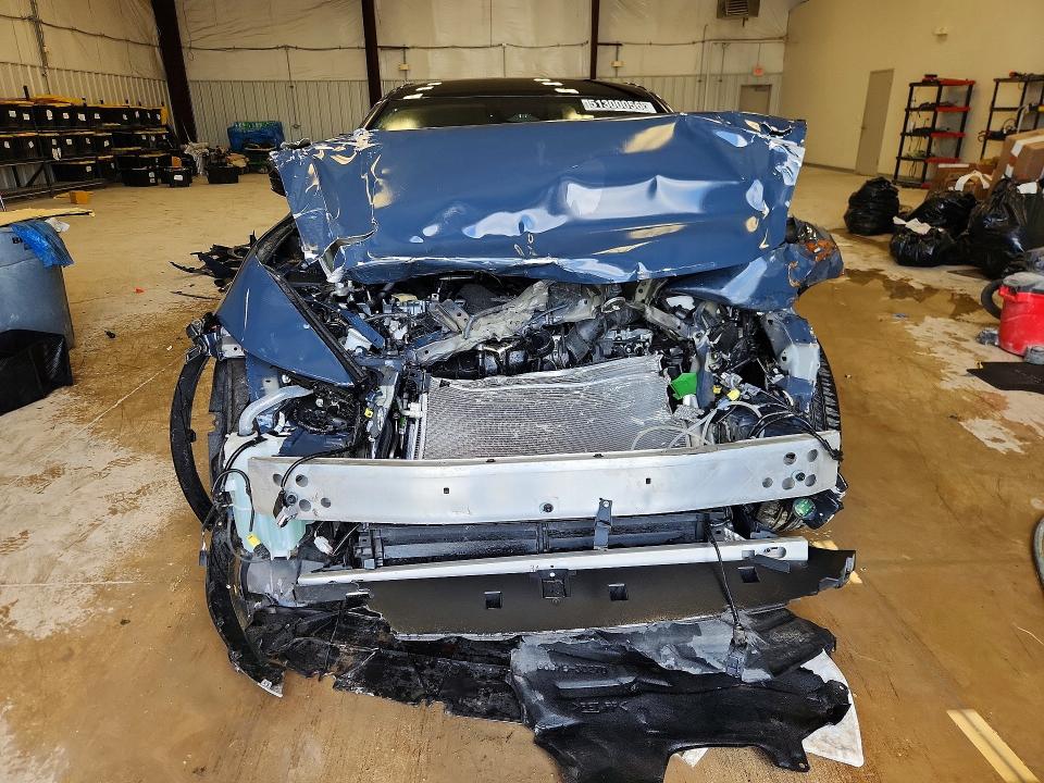 2026 Toyota Crown VIN JTDAAAAF5T3044038 COPART salvage auction — WATER/FLOOD, TX - SALVAGE TITLE-FLOOD DAMAGE, sold $200 on 2026-07-21 (photo 5)