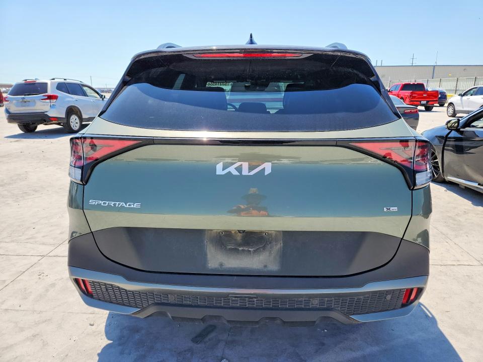 2023 Kia Sportage VIN 5XYK7CAF5PG017700 COPART salvage auction — SIDE, Tx - Salvage Vehicle Title, sold $11,500 on 2026-07-17 (photo 6)
