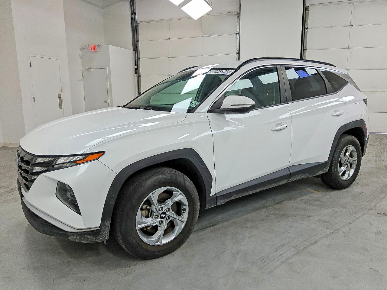 2022 Hyundai Tucson VIN 5NMJBCAEXNH031399 COPART salvage auction — Normal Wear, IN - CERTIFICATE OF TITLE, sold $16,400 on 2026-07-09 (photo 1)