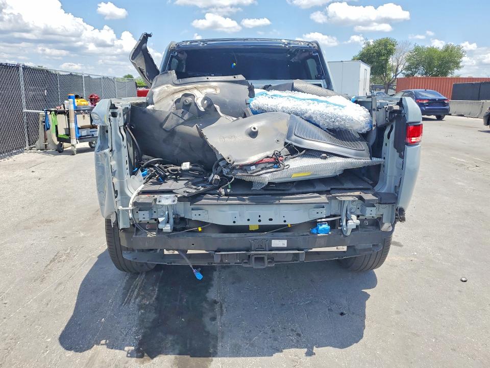 2022 Rivian R1t VIN 7FCTGAAA4NN006751 COPART salvage auction — SIDE, FL, sold $17,400 on 2026-09-15 (photo 6)