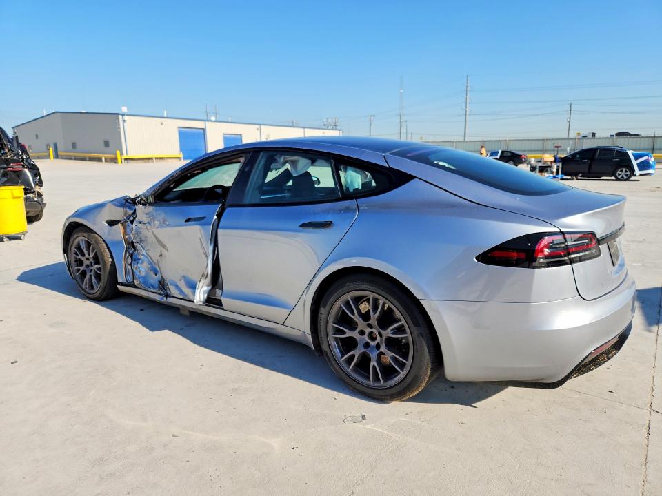 2025 Tesla Model s VIN 5YJSA1E58SF551202 COPART salvage auction — SIDE, Tx - Certificate Of Title, sold $20,300 on 2026-07-21 (photo 2)