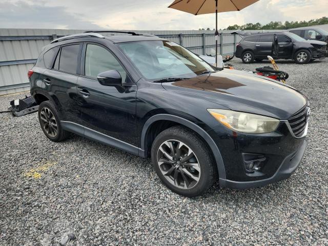 2016 Mazda Cx-5 VIN JM3KE2DY3G0647404 COPART salvage auction — REAR END, Fl - Cert Of Title Slvg Rebuildable, sold $3,700 on 2026-07-10 (photo 4)