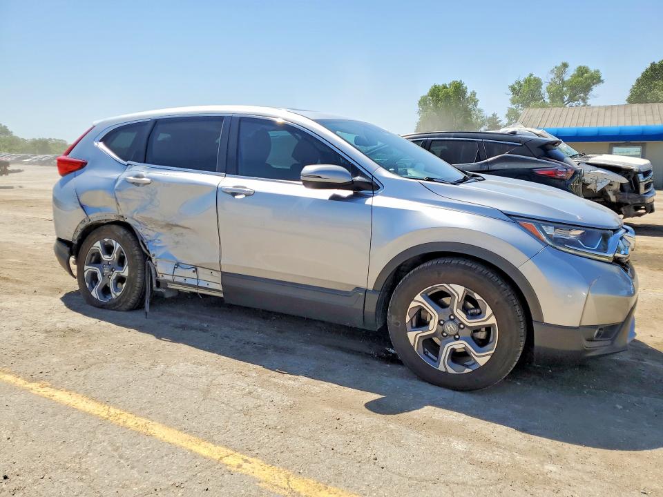 2018 Honda Cr-v VIN 7FARW1H83JE037749 COPART salvage auction — SIDE, KS - CERT OF TITLE-SALVAGE, sold $7,200 on 2026-07-13 (photo 4)