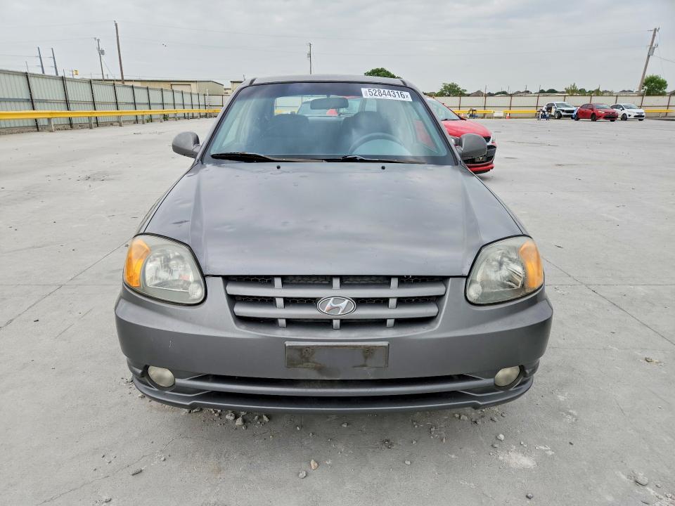 2005 Hyundai Accent VIN KMHCG35C75U322188 COPART salvage auction — HAIL, Tx - Certificate Of Title, sold $150 on 2026-07-28 (photo 5)