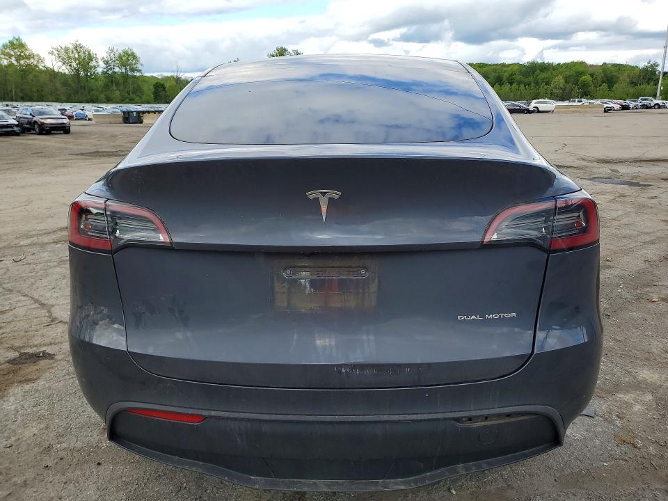2023 Tesla Model y VIN 7SAYGDEE6PF868433 COPART salvage auction — SIDE, NY - MV-907A SALVAGE CERTIFICATE, sold $7,500 on 2026-07-28 (photo 6)