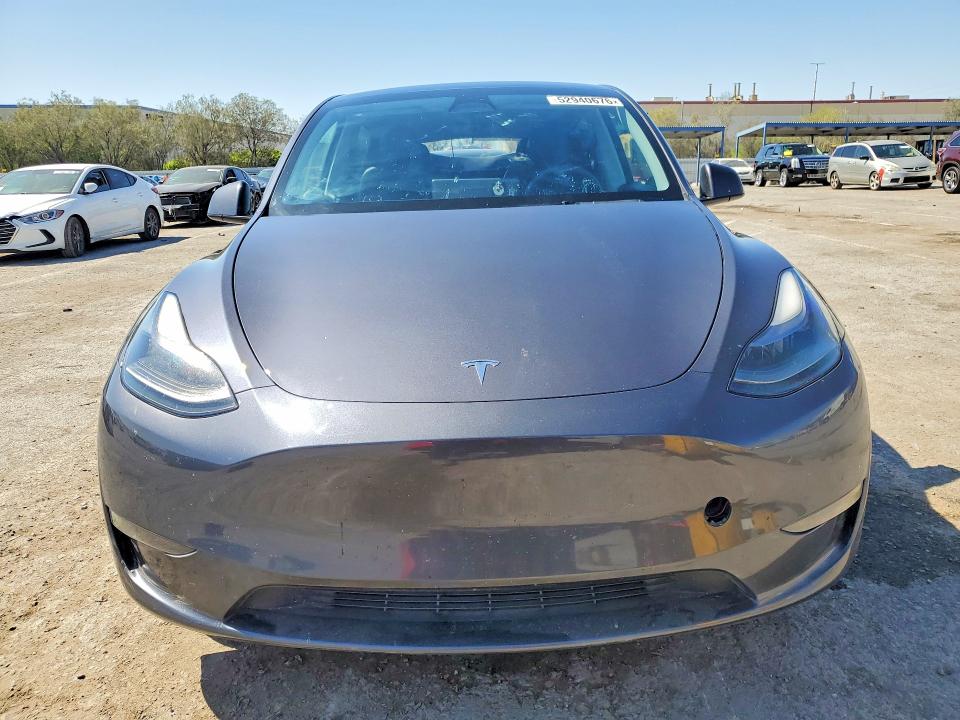 2023 Tesla Model y VIN 7SAYGAEE6PF700385 COPART salvage auction — REAR END, Ut - Salvage Certificate, sold $9,400 on 2026-08-27 (photo 5)