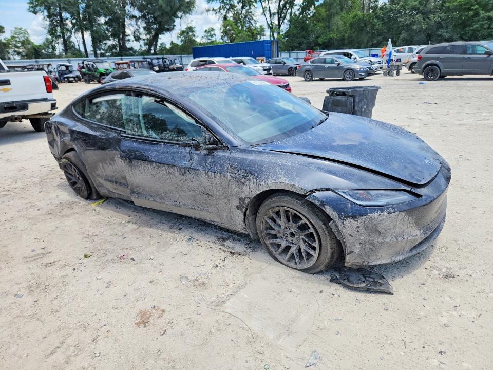 2025 Tesla Model 3 VIN 5YJ3E1EA5SF987947 COPART salvage auction — ROLLOVER, Fl - Cert Of Title Slvg Rebuildable, sold $9,200 on 2026-07-07 (photo 4)