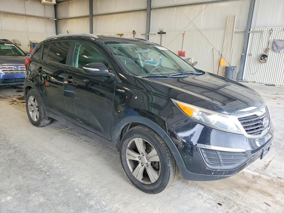 2011 Kia Sportage VIN KNDPBCA2XB7153330 COPART salvage auction — HAIL, Ne - Certificate Of Title, sold $750 on 2026-07-02 (photo 4)