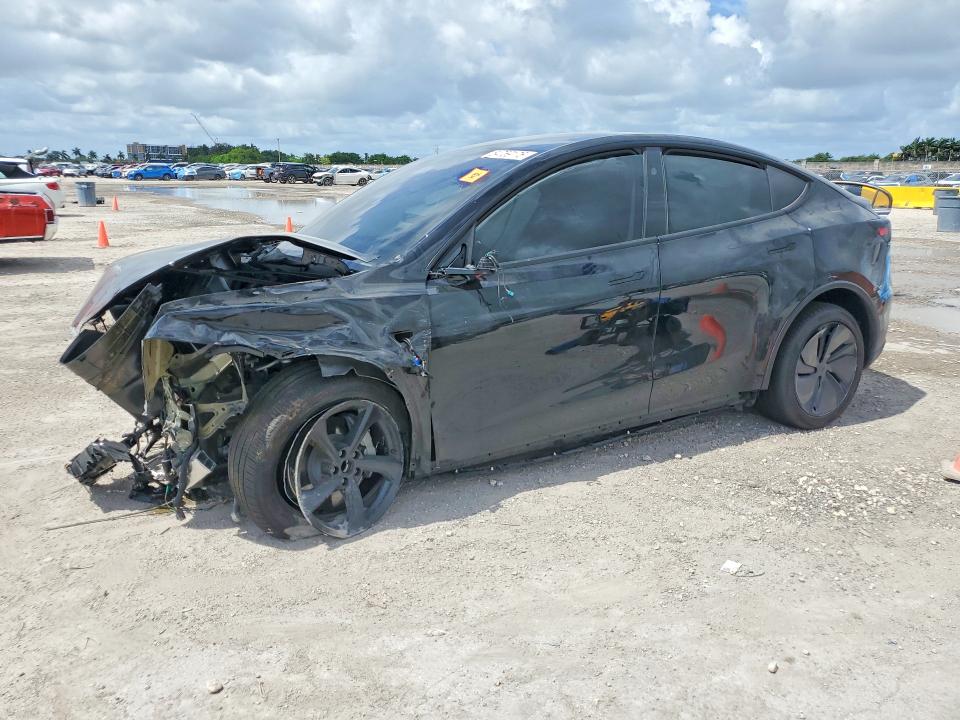 2026 Tesla Model y VIN 7SAYGDED8TA616147 COPART salvage auction — FRONT END, Fl - Cert Of Title Slvg Rebuildable, sold $8,700 on 2026-07-08 (photo 1)