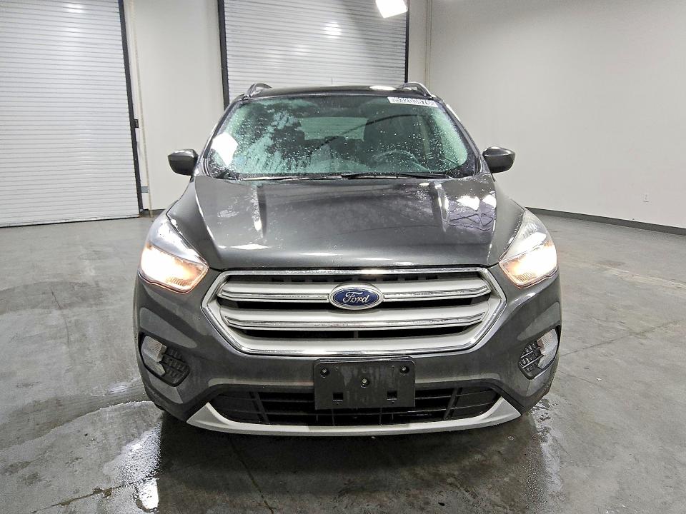 2018 Ford Escape VIN 1FMCU9GD1JUC10675 COPART salvage auction — MINOR DENT/SCRATCHES, MA - CERTIFICATE OF TITLE, sold $1,500 on 2026-07-09 (photo 5)