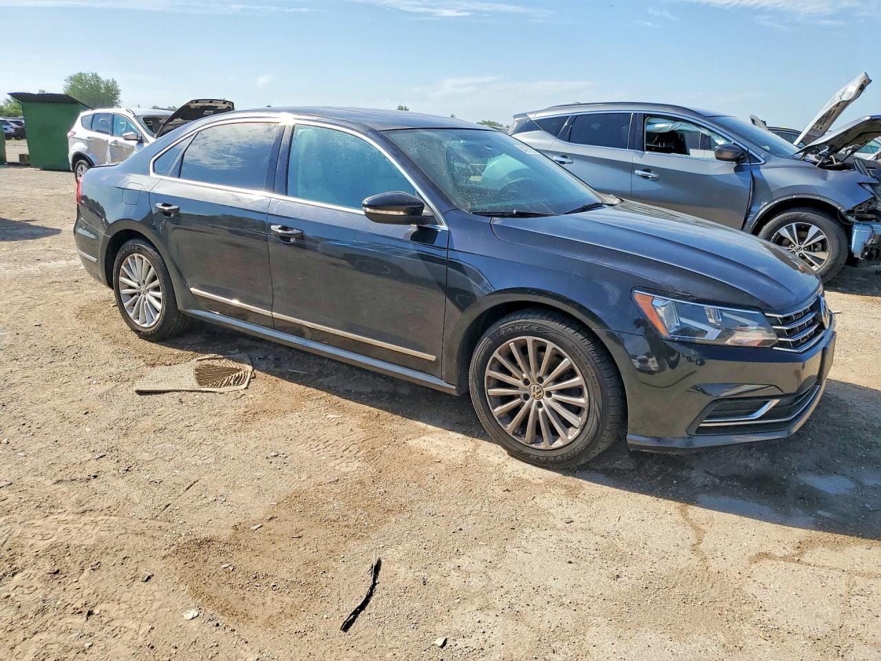2017 Volkswagen Passat VIN 1VWBT7A3XHC018434 COPART salvage auction — Rear End, IL - SALVAGE CERTIFICATE, sold $2,950 on 2026-07-02 (photo 4)