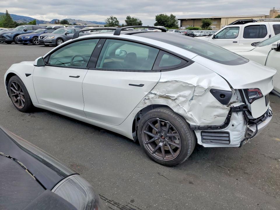 2022 Tesla Model 3 VIN 5YJ3E1EBXNF180630 COPART salvage auction — REAR END, Ca - Salvage Certificate, sold $8,800 on 2026-07-14 (photo 2)