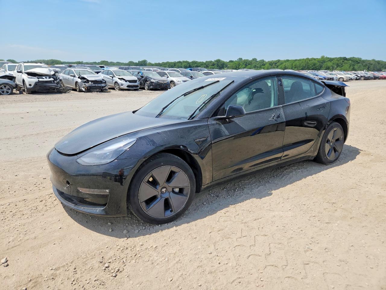 2022 Tesla Model 3 VIN 5YJ3E1EB2NF203544 COPART salvage auction — Side, KS - CERT OF TITLE-SALVAGE, sold $6,000 on 2026-07-09 (photo 1)
