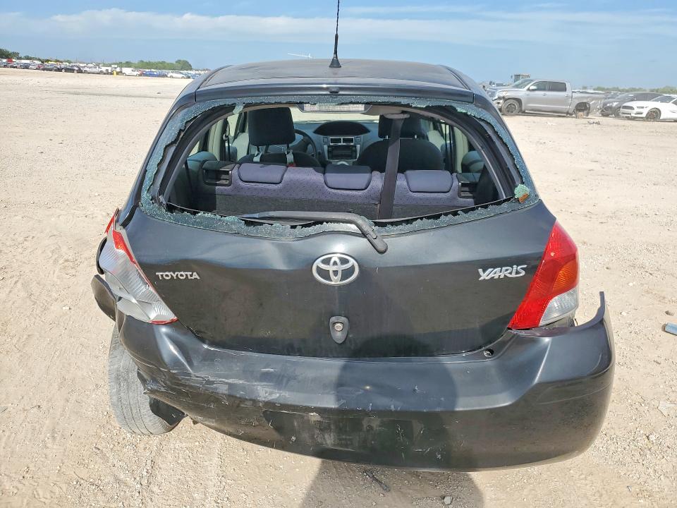 2011 Toyota Yaris VIN JTDKT4K30B5330516 COPART salvage auction — REAR END, Tx - Salvage Vehicle Title, sold $1,000 on 2026-07-16 (photo 6)