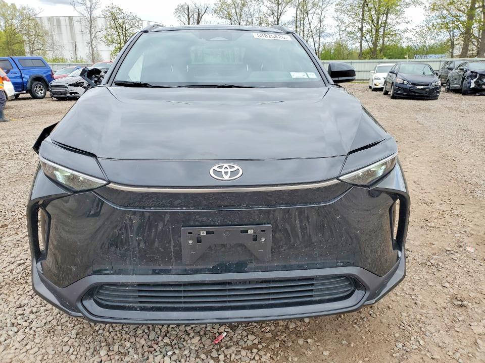 2025 Toyota Bz4x VIN JTMABACA0SA105465 COPART salvage auction — SIDE, NY - MV-907A SALVAGE CERTIFICATE, sold $12,900 on 2026-07-09 (photo 5)