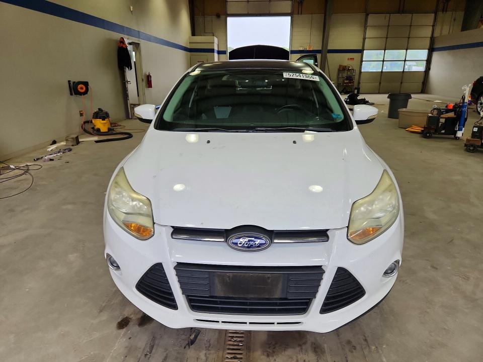 2014 Ford Focus VIN 1FADP3K22EL320011 COPART salvage auction — MINOR DENT/SCRATCHES, VA - CERTIFICATE OF TITLE, sold $450 on 2026-07-02 (photo 5)