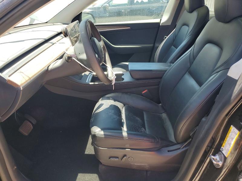 2023 Tesla Model y VIN 7SAYGDEE5PF674377 COPART salvage auction — FRONT END, Nv - Salvage Title, sold $9,500 on 2026-07-22 (photo 7)